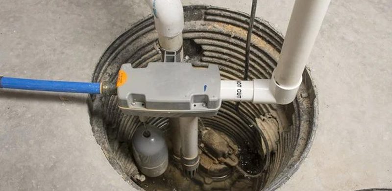 Photo of a sump pump in the sump pump pit.